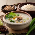rice porridge with vegetables and egg in bowl, food closeup