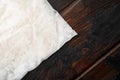 Rice in portion bags, on old dark wooden table background, top view flat lay, with copy space for text