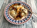 Rice potatoes and artichokes baked meal