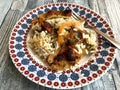 Rice potatoes and artichokes baked meal