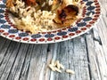 Rice potatoes and artichokes baked meal