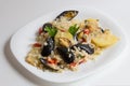 Traditional apulian dish rice, potatoes and mussels, Bari cuisine Apulia, close up, on the white plate Royalty Free Stock Photo