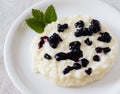 Rice pudding with blueberry cream Royalty Free Stock Photo
