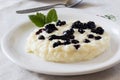 Rice pudding with blueberry cream Royalty Free Stock Photo