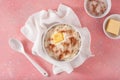 Rice pudding with butter cinnamon. french riz au lait, norwegian risgrot, traditional breakfast dessert