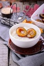 Rice pudding with caramel vanilla plums Royalty Free Stock Photo