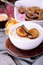 Rice pudding with caramel vanilla plums Royalty Free Stock Photo