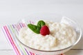Rice pudding with mint and raspberry Royalty Free Stock Photo
