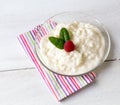 Rice pudding with mint and raspberry Royalty Free Stock Photo