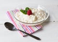 Rice pudding with mint and raspberry Royalty Free Stock Photo