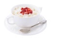 Rice pudding with slice of strawberry on white background