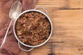 Rice with rabbit on dish on wooden background