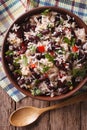Rice with red beans and vegetables in a bowl close-up. vertical Royalty Free Stock Photo