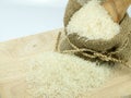 Rice in sack on choping broad Royalty Free Stock Photo