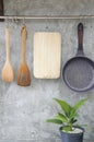 Rice scoop,wooden spatula and pan are on hanging rail.Cooking in kitchen decorate concept.Tools or equipment for mixed or cooking