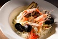 Rice with seafood on a plate in restauant ready to be served Royalty Free Stock Photo