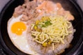 Rice served with cheese, egg and chicked in sizzling plate Royalty Free Stock Photo