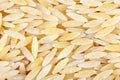 Rice-shaped pasta texture. View from above. Close-up Royalty Free Stock Photo