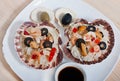 Rice in the shell, decorated with seafood, shrimps, mussels, squid rings and olives. Royalty Free Stock Photo