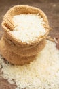 Rice in small burlap sack. Royalty Free Stock Photo