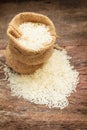 Rice in small burlap sack. Royalty Free Stock Photo