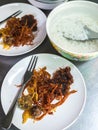 Rice soaked in ice water with side dish, sweetened beef, kapi ball Royalty Free Stock Photo