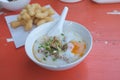 Rice soup or Congee minced pork and entrails with egg