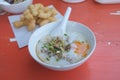 Rice soup or Congee minced pork and entrails with egg