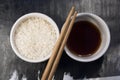 Rice, soy sauce and chopsticks1 Royalty Free Stock Photo