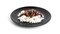 Rice with spicy chicken in sweet and sour sauce with chili pepper. Teriyaki chicken with sesame seeds. Isolated on white