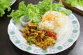 Rice, stir fried hot and spicy curry with chicken and fried egg