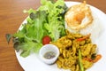 Rice, stir fried hot and spicy curry with chicken and fried egg