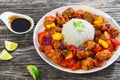 Rice with Sweet and Sour fried pork chunks with vegetables Royalty Free Stock Photo