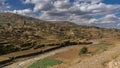 Rice terraces descend in ledges down the hill to the river. Royalty Free Stock Photo