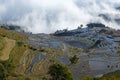 Rice terraces of Yunnan at sunrise with fog, China.