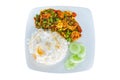 Rice topped with Fried chilly paste with pork and basil and seafood with Fried egg Sunny side up medium, isolated