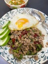 Rice topped stir-fried chicken and basil with Fried egg Royalty Free Stock Photo