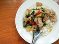 Rice topped with stir-fried pork and basil