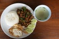 Rice topped with stir-fried pork and basil Royalty Free Stock Photo