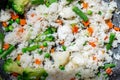 Rice with vegetables - peas, carrots, green beans. Vegetarian healthy food Royalty Free Stock Photo