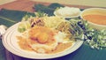 Rice vermicelli with fish curry sace and vegetable Thai food retro photo