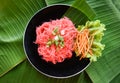 Rice vermicelli pink frying and vegetable - Stir fried rice noodles with red sauce served on plate on banana feaf , Thai Asian