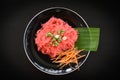 Rice vermicelli pink frying and vegetable - Stir fried rice noodles with red sauce served on plate on black background , Thai