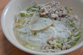 Rice vermicelli topping fish line and boiled minced pork in soup