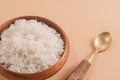 Rice white in bowl on brown table Asian healthy food concept. Royalty Free Stock Photo