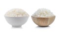 Rice in a white bowl and wood bowl on white background Royalty Free Stock Photo