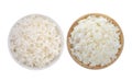 Rice in a white bowl and wood bowl on white background Royalty Free Stock Photo