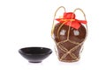 Rice wine jar and ceramic bowl Royalty Free Stock Photo