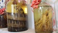 Rice wine soaked with mandrakes and snakes