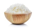 Rice in wood bowl on white background Royalty Free Stock Photo